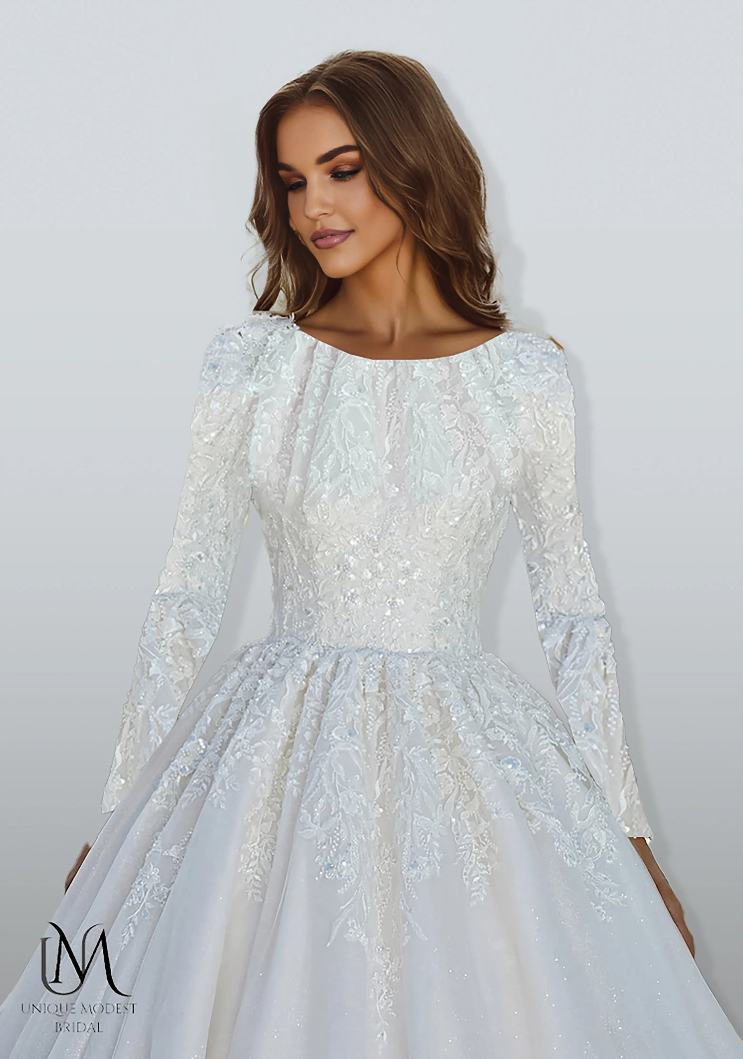Radiantique - Elegant A-Line / Ball Gown Modest Wedding Dress